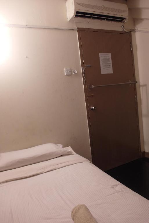 Number Eight Guesthouse Κουάλα Λουμπούρ Δωμάτιο φωτογραφία