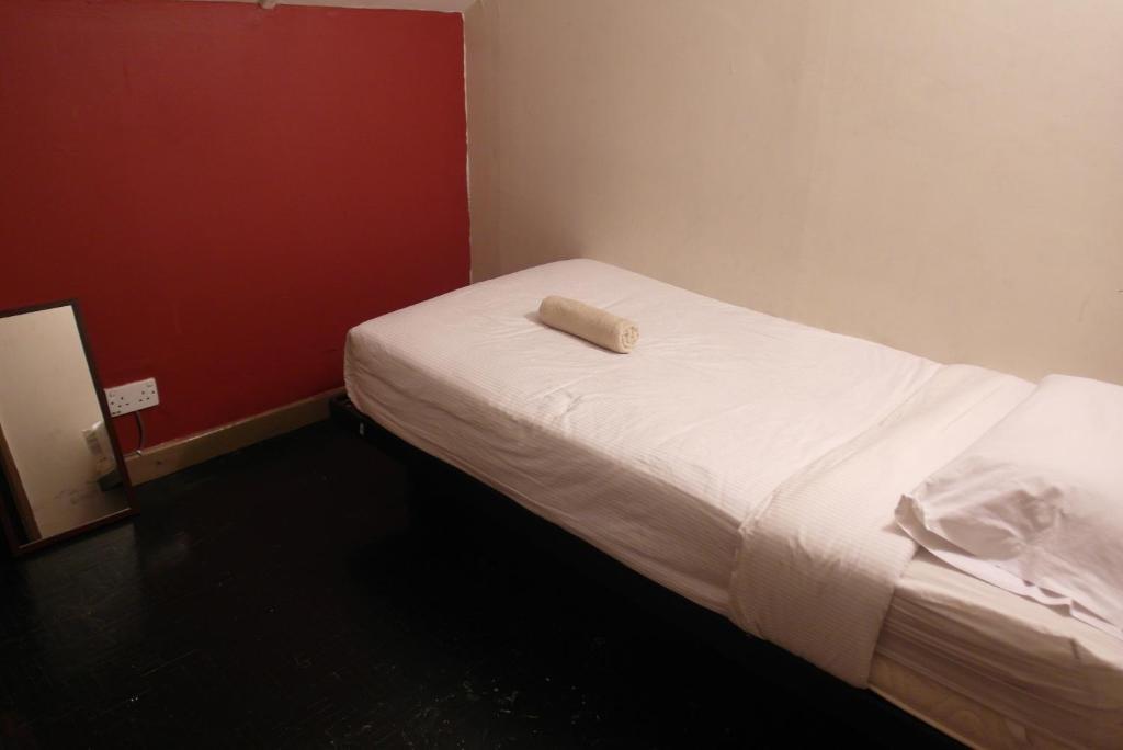 Number Eight Guesthouse Κουάλα Λουμπούρ Δωμάτιο φωτογραφία